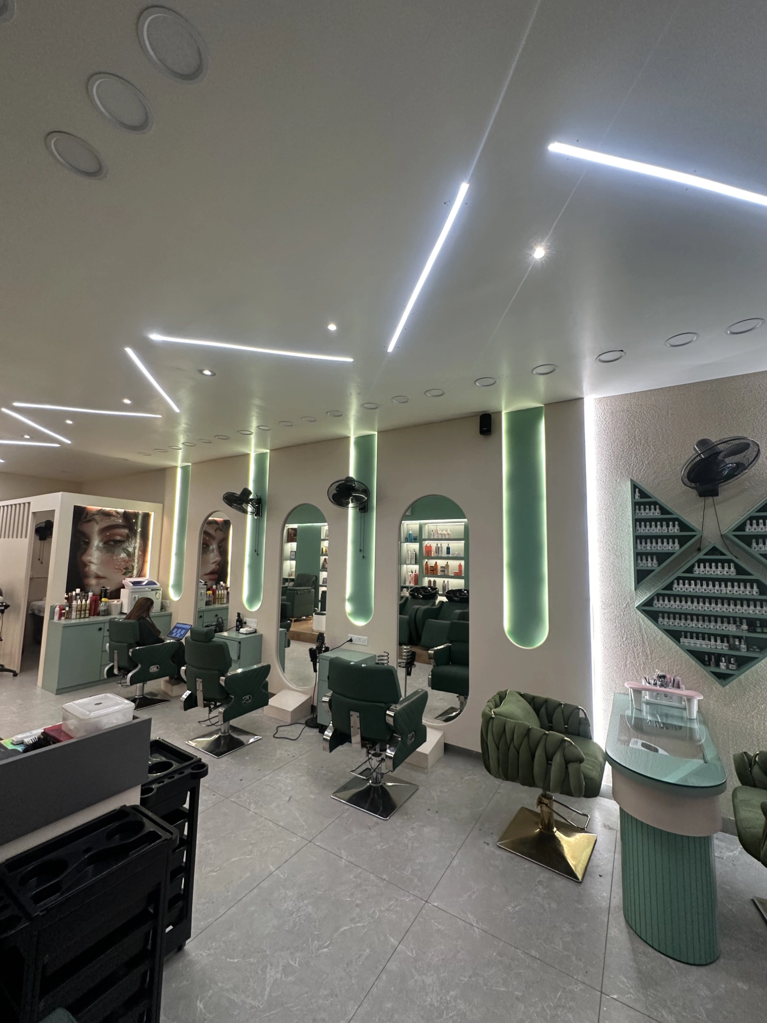 Interior of Iconik Salon Hisar showcasing a modern, stylish setup with premium styling stations, mirrors, and seating in a luxury unisex salon in Hisar, designed for comfort, hygiene, and a professional beauty experience.
