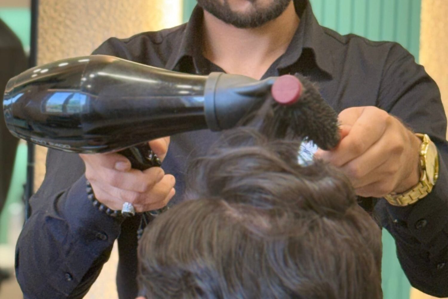 Using a roller and hair drayer, and in this post there we can see the background of Iconik Salon, one of the best unisex salons in Jisar.